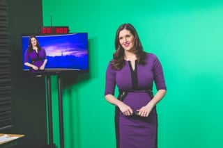 AccuWeather Broadcast Meteorologist Julia Weiden wears a purple version of "The Dress." (Photo/Taliya Riesterer)