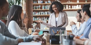 young-afro-woman-manager-leading-morning-briefing-in-office-picture-id1202954911 (1)